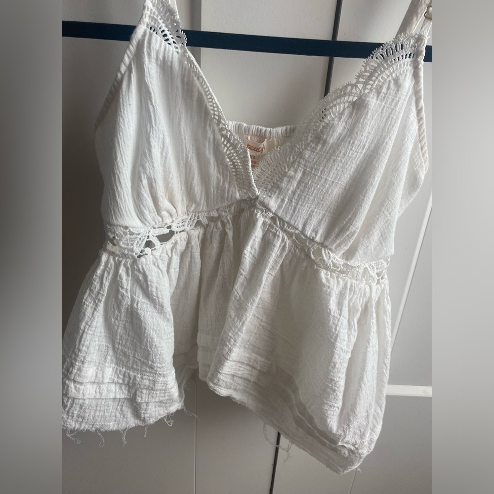White flowy top